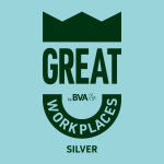 A badge featuring a crown and the phrases GREAT WORKPLACES by BVA and SILVER displayed against a pale blue background.